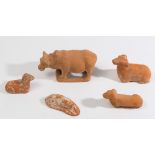 A group of five Chinese terracotta animals: with traces of painted decoration,