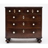 An apprenticeman's early 19th century mahogany bow-fronted chest: with reel turned mouldings and