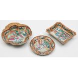 A group of three Chinese Canton famille rose dishes: painted with panels of insects, birds,