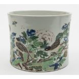 A large Chinese famille verte brushpot: of waisted cylindrical form, painted with birds,