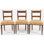 A set of six Regency mahogany and inlaid dining chairs:,