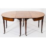 An early 19th century mahogany and inlaid D-end dining table:, the top with a reeded edge,