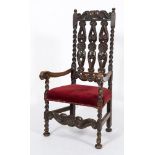 A 17th century and later carved oak open armchair::,