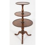 A mid 18th Century mahogany circular three-tier graduated dumb waiter:,