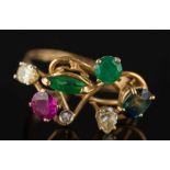 A diamond, emerald, ruby and sapphire seven stone ring: of various shapes and size, ring size M 1/2.