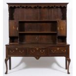 A late 18th century oak and mahogany crossbanded and inlaid dresser:,