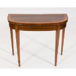 An early 19th Century rosewood, satinwood crossbanded and inlaid card table:, of D shaped outline,
