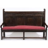 A 17th century oak and inlaid settle:,