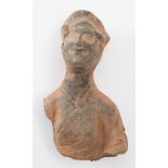 A Chinese pottery head and shoulders bust: of a smiling female wearing headdress,