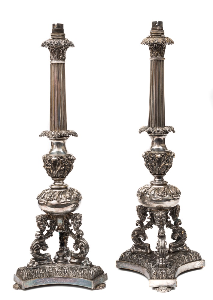 A pair of plated Corinthian column table lamps: with foliate capitals and fluted columns,