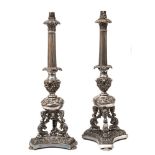 A pair of plated Corinthian column table lamps: with foliate capitals and fluted columns,