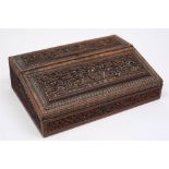 An Indian carved hardwood writing slope: bordered with mother-of-pearl inlay,