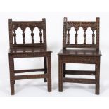 Two similar 18th century Italian carved walnut side chairs: with gouged and arcaded spindle backs
