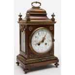 A French mahogany mantel clock: the eight-day duration movement striking the hours and half-hours