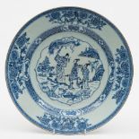 A Chinese porcelain blue and white charger: of circular form painted with three Immortals and a