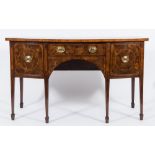 A George III mahogany crossbanded and inlaid bow fronted sideboard:,