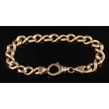 A 9ct gold curb-link bracelet: approximately 19cm long including clasp, 21gms gross weight.