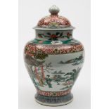 A Chinese porcelain baluster jar and domed cover: enamelled front and verso with panels containing