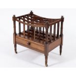 An early 19th century mahogany four-division canterbury: with curved and slatted divisions and