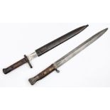 An 1881 pattern Lee Enfield bayonet stamped '92, together with a German Ersatz bayonet in scabbard:.