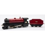 A Markie O gauge 4-4-0 live steam locomotive and tender:,