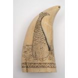 A scrimshaw decorated tooth:,