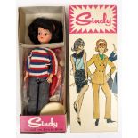 A 'Sindy in Weekenders' doll in original box by Pedigree:, together with stand,