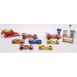 A collection of racing cars and sports cars including a Corgi Ferrari 312/B12,