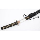 A Japanese katana:, the blade over a gilt highlighted dragon decorated piercework tsuba,