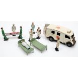 A small group of Britains hospital figures together with Tri-ang Minic clockwork ambulance:.