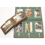 An Edwardian postcard album containing GB topographical, portrait and humorous cards:,