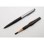 A Montblanc 'Monte Rosa' fountain pen and a Dunhill cigarette holder:,