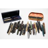 A collection of various fountain pens:, various makers including Sumit, Sheaffer,