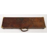 A brass mounted leather gun case by George Bate, Birmingham:, with red lined fitted interior,