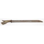 An Indonesian short sword (Mandu):, the single edged Damascus blade with carved horn handle,