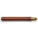 A 2 1/2 inch mahogany cased 'Day or Night; single draw telescope by Proctor Beilby & Co, London:,