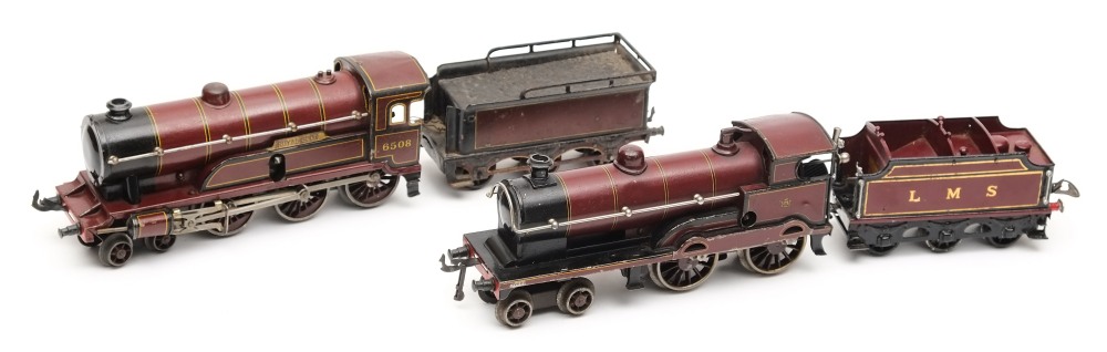 Bing a 4-4-0 clockwork locomotive with matched Hornby six wheel tender: in LMS maroon livery