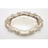 A silver cartouche shaped serving dish for the 54th West Norfolk Regiment by Benjamin Smith III,