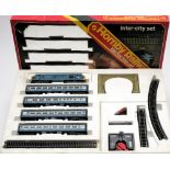 A Hornby 'Inter-city set' in original box:, in BR livery with Co-Co Diesel loco and carriages.