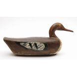 A carved wooden duck decoy:, hand finished with lead weight to underside, 43cm long.