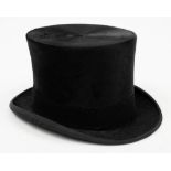 A black felt top hat by Christys London for Austin Reed:.