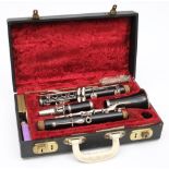 A 20th century English clarinet:, numbered 256818 with silver plated keys, in a fitted case.