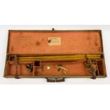 A leather and canvas gun case by F R Furlong, Saffron Waldron:,