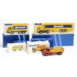 A Dinky Leyland Comet flatbed lorry together with four Corgi Classic lorries in 'Weetabix' livery:.