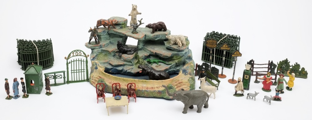 A collection of Britains Zoo figures and animals:, including Polar bear, Llama, elephant and camels,