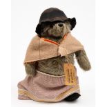 A Paddington's Aunt Lucy bear by Gabrielle Designs:, with original luggage label, hat and glasses,