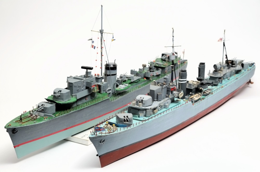 A scale model of the K -class destroyer HMS Kelly and another of the Tribal-class destroyer HMS