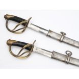 A pair of 19th century light cavalry sabres:,