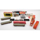 A collection of Hornby and Tri-ang railway:, including an 0-6-0 BR tank locomotive,