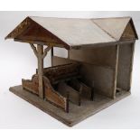 A late 19th/early 20th century wooden dolls stable 'Square Pinnell's Stable':,